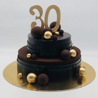 Dviejų aukštų tortas su auksiniais ir šokoladiniais burbulais