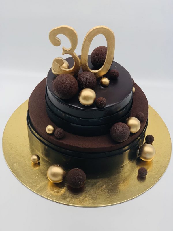 2 aukštų tortas su auksiniais ir šokoladiniais burbulais