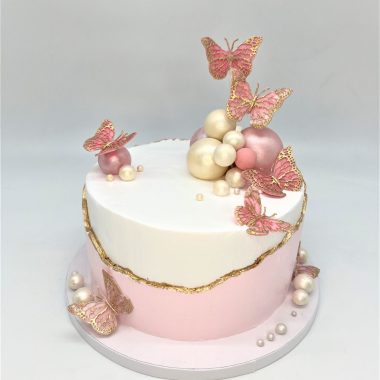 Rožinis tortas su drugeliais